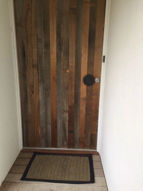 Feel secured and private with this Wooden Door and handle perfect for a rustic feel